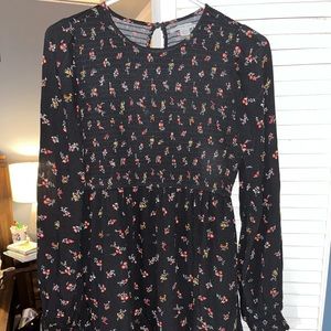 Beautiful black dress with flowers on it. Barely has ever been used, looks new !